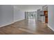 Spacious living room with beautiful hardwood floors, recessed lighting, and views of the pool at 2777 Paradise Rd # 301, Las Vegas, NV 89109