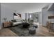 Comfortable living room with stylish decor, natural light, and a balcony with city views at 2777 Paradise Rd # 301, Las Vegas, NV 89109