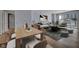 Open concept living room and dining room with designer finishes, comfortable seating, and neutral colors at 2777 Paradise Rd # 301, Las Vegas, NV 89109