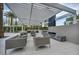 Outdoor lounge area with a fireplace and comfortable seating, great for entertaining or relaxing at 2777 Paradise Rd # 301, Las Vegas, NV 89109