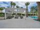 Stylish poolside lounge area with comfortable seating and a modern pergola for shade and relaxation at 2777 Paradise Rd # 301, Las Vegas, NV 89109