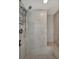 Updated shower stall with tile surround and built-in bench at 2777 Paradise Rd # 301, Las Vegas, NV 89109