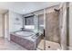 Bathroom showcasing a luxurious tub and enclosed glass shower with tile surround at 28 Vista Outlook St, Henderson, NV 89011