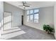 A spacious, modern bedroom showcases an airy feel with its ample natural light and neutral tones at 28 Vista Outlook St, Henderson, NV 89011