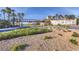 Beautiful Lake Las Vegas community entrance with bridge and lush landscaping at 28 Vista Outlook St, Henderson, NV 89011