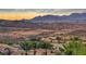 Stunning mountain and community view with palm trees in the foreground at 28 Vista Outlook St, Henderson, NV 89011
