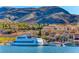 Picturesque waterfront view of Lake Las Vegas with mountain backdrop at 28 Vista Outlook St, Henderson, NV 89011