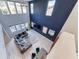 Open concept design reveals the well-lit living space, showcasing sleek finishes and bright natural light at 28 Vista Outlook St, Henderson, NV 89011
