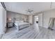 Spacious main bedroom featuring ample light, neutral decor, and ensuite access at 28 Vista Outlook St, Henderson, NV 89011