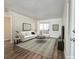 Inviting living room featuring neutral tones, contemporary decor, and a sliding glass door for natural light, creating a welcoming atmosphere at 3038 Tarpon Dr # 103, Las Vegas, NV 89120