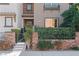 Inviting front of home featuring well-maintained landscaping, decorative stonework, and a charming entrance at 3185 Mura Del Prato Ave, Henderson, NV 89044