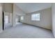 Spacious bedroom offers comfortable carpet, natural light, and closet at 331 Seine Way # 331, Henderson, NV 89014