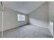 Well-lit bedroom with neutral carpeting and a mirrored closet at 331 Seine Way # 331, Henderson, NV 89014