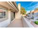 Comfortable outdoor patio area with views of the building's common areas at 331 Seine Way # 331, Henderson, NV 89014