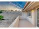 Private outdoor patio offering views of desert landscaping and nearby homes at 331 Seine Way # 331, Henderson, NV 89014