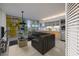 Cozy living area featuring modern furniture, a rug, and kitchen access at 3726 Las Vegas Blvd # 609, Las Vegas, NV 89158