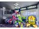 Arcade room featuring driving games, carpet and accent lighting at 3911 Kamden Way, Las Vegas, NV 89119