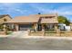 Attractive single Gathering home featuring stone accents, desert landscaping, and a spacious two car garage at 3911 Kamden Way, Las Vegas, NV 89119
