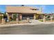 Attractive single Gathering home featuring stone accents, desert landscaping, and a spacious two car garage at 3911 Kamden Way, Las Vegas, NV 89119