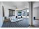 Enclosed hot tub room with sleek flooring, and plenty of light through large windows at 3911 Kamden Way, Las Vegas, NV 89119
