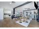 Open-concept kitchen and dining area, boasting bar seating and modern finishes at 3911 Kamden Way, Las Vegas, NV 89119