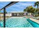 Full view of the spacious pool and a poolside cottage for outdoor relaxation and entertaining at 3911 Kamden Way, Las Vegas, NV 89119