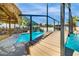 The pool has a bridge and waterfall features for recreational fun at 3911 Kamden Way, Las Vegas, NV 89119