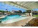 Outdoor pool featuring an elevated walkway and various entertaining spaces at 3911 Kamden Way, Las Vegas, NV 89119