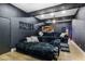 Theater room featuring tiered seating, projector and movie screen at 3911 Kamden Way, Las Vegas, NV 89119