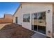 Low maintenance backyard with gravel landscaping and partial view of home at 4130 Lucas Ave, Las Vegas, NV 89120