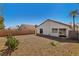 Wide angle of low maintenance backyard, featuring cactus at 4130 Lucas Ave, Las Vegas, NV 89120