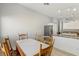 Open dining area with tiled floor and easy access to stainless steel kitchen appliances at 4130 Lucas Ave, Las Vegas, NV 89120