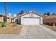 Charming single-story home featuring a well-maintained front yard and a two-car garage at 4130 Lucas Ave, Las Vegas, NV 89120
