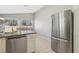 Kitchen featuring stainless steel appliances, granite countertops, and view to backyard at 4130 Lucas Ave, Las Vegas, NV 89120