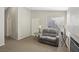 Living room featuring neutral colors, a gray couch, and plenty of natural light at 4130 Lucas Ave, Las Vegas, NV 89120