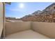 Balcony view showcasing nearby houses and lush landscaping on a sunny day at 461 Cascade Heights Ave, Las Vegas, NV 89138