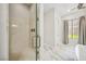 Bathroom includes a glass-enclosed shower with chrome fixtures and marble floors for a clean aesthetic at 47 Grand Masters Dr, Las Vegas, NV 89141