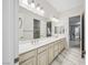 Bright bathroom with double sinks and view into the Bedroom at 47 Grand Masters Dr, Las Vegas, NV 89141