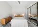 Modern bedroom features sleek design with mirrored closet at 47 Grand Masters Dr, Las Vegas, NV 89141