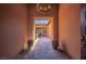 Elegant entryway featuring stone flooring, textured walls, and a chandelier at 47 Grand Masters Dr, Las Vegas, NV 89141
