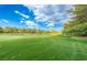 Expansive view of a well-maintained golf course with manicured green grass at 47 Grand Masters Dr, Las Vegas, NV 89141