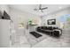 Spacious living room with modern furniture and bright lighting at 47 Grand Masters Dr, Las Vegas, NV 89141