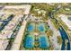 Aerial view of the community's tennis courts, set among trees, showcasing a great amenity at 47 Grand Masters Dr, Las Vegas, NV 89141