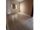 Bedroom featuring tile flooring and neutral-toned walls at 4824 Quartz Crest St, North Las Vegas, NV 89081