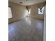 Bright bedroom with tile flooring and natural light at 4824 Quartz Crest St, North Las Vegas, NV 89081