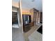 Spacious kitchen showcases stainless steel refrigerator and tiled floors at 4824 Quartz Crest St, North Las Vegas, NV 89081