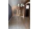 Bright, open-concept living room features tile flooring, neutral walls, and ample natural light at 4824 Quartz Crest St, North Las Vegas, NV 89081