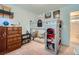 Fun bedroom with decorative castle bunk bed and adjacent access to the bathroom at 517 Primrose Hill Ave, Las Vegas, NV 89178