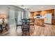 Eat-in kitchen area featuring wood floors, and a sliding glass door for seamless indoor/outdoor living at 517 Primrose Hill Ave, Las Vegas, NV 89178