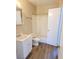A full bathroom with a tub, shower and single sink at 530 Sellers Pl, Henderson, NV 89011